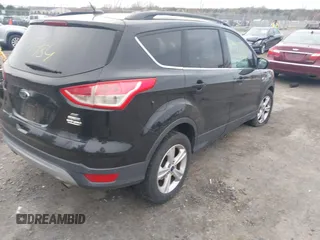 2016 Ford Escape SE with VIN 1FMCU9GX6GUA81609, listed as a IAAI auction lot 41947984 with 159,254 mi miles. Bid and sale history available at carsss.com. Image 4.