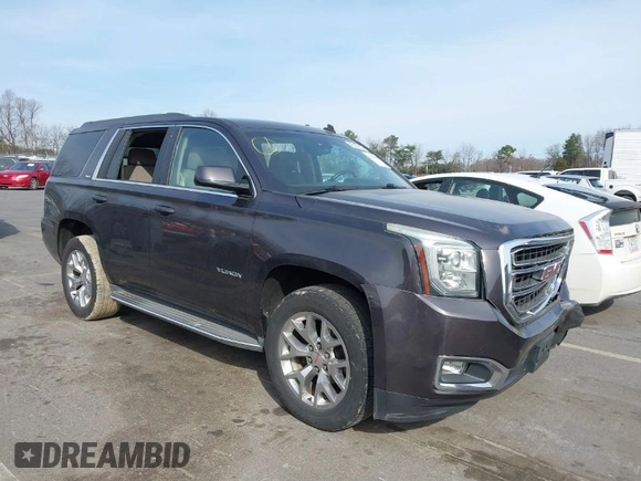 2015 GMC Yukon SLE with VIN 1GKS1AKCXFR269862, listed as a IAAI auction lot 41784763 with 156,286 mi miles. Bid and sale history available at carsss.com. Image 1.