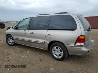 2003 Ford Windstar SE with VIN 2FMDA52413BB59104, listed as a Copart auction lot 55134805 with 132,918 mi miles and Salvage title. Bid and sale history available at DreamBid. Image 2.