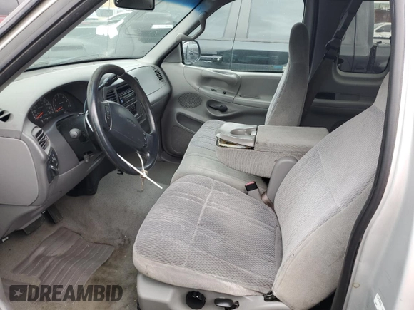 1998 Ford F-150 XL with VIN 1FTRX17L3WKB36791, listed as a Copart auction lot 42141915 with 201,067 mi miles and Salvage title. Bid and sale history available at DreamBid. Image 7.