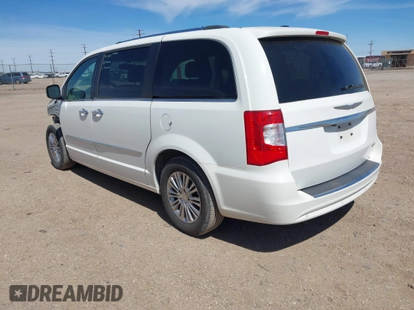 2011 Chrysler Town & Country Limited with VIN 2A4RR6DG2BR611268, listed as a IAAI auction lot 41853613 with 99,859 mi miles. Bid and sale history available at carsss.com. Image 3.