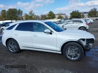 2023 Genesis GV70 2.5T with VIN KMUMADTB9PU116204, listed as a IAAI auction lot 41538174 with 19,950 mi miles. Bid and sale history available at carsss.com. Image 13.