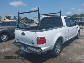 2001 Ford F-150 XLT with VIN 1FTRW07L91KB77612, listed as a IAAI auction lot 42432387 with 106,574 mi miles and . Bid and sale history available at DreamBid. Image 4.