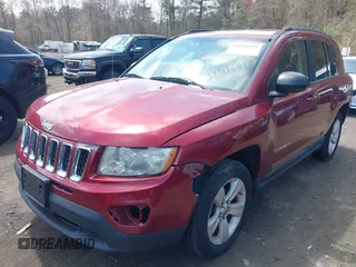 2011 Jeep Compass Latitude with VIN 1J4NT1FB8BD170401, listed as a IAAI auction lot 42094953 with 122,617 mi miles. Bid and sale history available at carsss.com. Image 2.