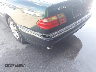 2002 Mercedes-Benz E-Class with VIN WDBJF65J92B458634, listed as a IAAI auction lot 41910356 with 1 mi miles. Bid and sale history available at carsss.com. Image 13.