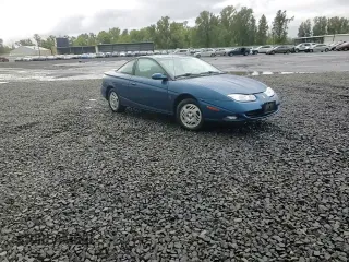 2001 Saturn SC z VIN 1G8ZR12791Z118164, wystawiony jako Copart lot #74393904 z przebiegiem 158 308 mil mil oraz Szkoda całkowita • Salvage title. Historia ofert i sprzedaży dostępna na DreamBid. Obrazek 11.