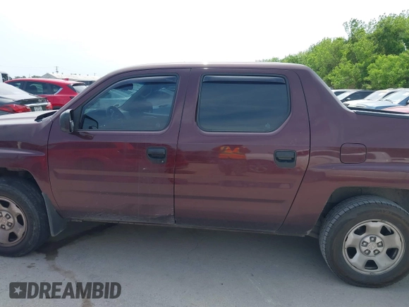 2009 Honda Ridgeline RT with VIN 5FPYK16239B109716, listed as a IAAI auction lot 42068772 with 206,649 mi miles. Bid and sale history available at carsss.com. Image 14.