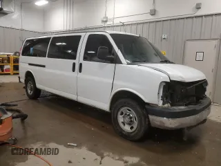 2014 Chevrolet Express Passenger LT with VIN 1GAZG1FG4E1176590, listed as a Copart auction lot 83660024 with 167,653 mi miles and Salvage title. Bid and sale history available at DreamBid. Image 4.