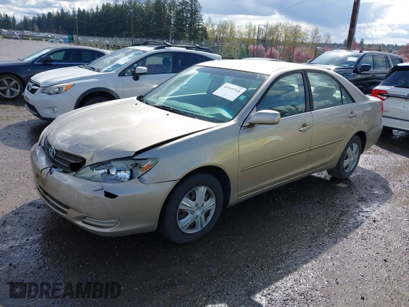 2004 Toyota Camry LE with VIN JTDBE32K440272373, listed as a IAAI auction lot 41949768 with 205,093 mi miles. Bid and sale history available at carsss.com. Image 2.