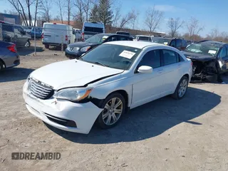 2012 Chrysler 200 Touring with VIN 1C3CCBBB1CN222038, listed as a IAAI auction lot 41894378 with 180,715 mi miles and . Bid and sale history available at carsss.com. Image 2.