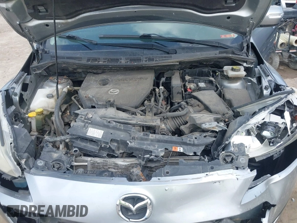 2014 Mazda 5 Sport with VIN JM1CW2BL6E0164195, listed as a IAAI auction lot 42455158 with 155,007 mi miles and . Bid and sale history available at DreamBid. Image 10.