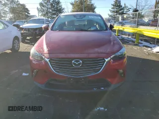 2018 Mazda CX-3 Grand Touring z VIN JM1DKFD75J0319224, wystawiony jako Copart lot #87504495 z przebiegiem 47 466 mil mil oraz Szkody całkowita. Historia ofert i sprzedaży dostępna na DreamBid. Obrazek 5.
