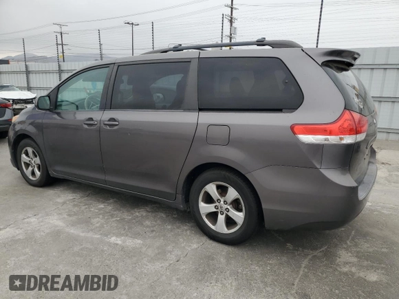 2012 Toyota Sienna LE AAS with VIN 5TDKK3DC0CS242667, listed as a Copart auction lot 65041005 with 196,322 mi miles and Clean title. Bid and sale history available at DreamBid. Image 2.