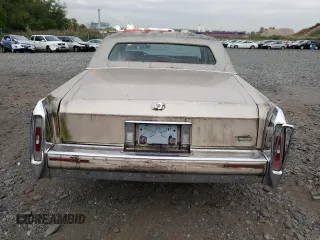 1992 Cadillac Brougham z VIN 1G6DW5479NR710170, wystawiony jako Copart lot #70194164 z przebiegiem Nie podano mil oraz Nie do naprawy. Historia ofert i sprzedaży dostępna na DreamBid. Obrazek 6.
