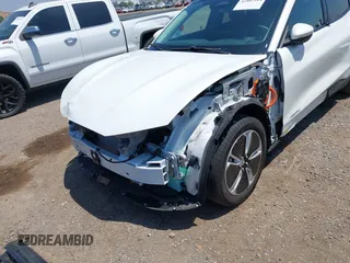 2021 Ford Mustang Mach-E Select z VIN 3FMTK1RM1MMA49774, wystawiony jako IAAI lot #42462914 z przebiegiem 16 754 mil mil oraz . Historia ofert i sprzedaży dostępna na DreamBid. Obrazek 6.