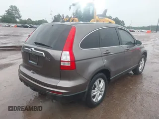 2010 Honda CR-V EX-L with VIN 5J6RE3H79AL041958, listed as a IAAI auction lot 42203039 with 160,336 mi miles and . Bid and sale history available at carsss.com. Image 4.