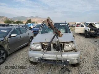 2004 Suzuki Grand Vitara LX z VIN JS3TD62V744104983, wystawiony jako Copart lot #65290274 z przebiegiem Nie podano mil oraz Szkoda całkowita • Salvage title. Historia ofert i sprzedaży dostępna na DreamBid. Obrazek 9.