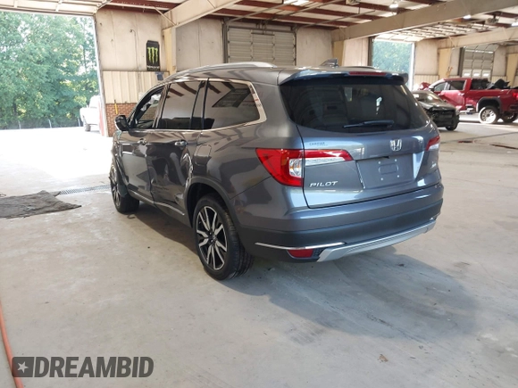 2021 Honda Pilot Touring 8-Passenger with VIN 5FNYF6H95MB048527, listed as a IAAI auction lot 42542138 with 40,584 mi miles and . Bid and sale history available at DreamBid. Image 3.