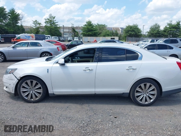 2013 Lincoln MKS EcoBoost with VIN 1LNHL9FT0DG606567, listed as a IAAI auction lot 42561162 with 285,830 mi miles and . Bid and sale history available at DreamBid. Image 14.