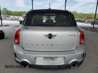 2014 MINI Countryman S with VIN WMWZC3C56EWP29211, listed as a Copart auction lot 52521145 with 91,396 mi miles and Salvage title. Bid and sale history available at DreamBid. Image 6.