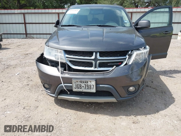 2017 Dodge Journey SXT z VIN 3C4PDCBB9HT507917, wystawiony jako IAAI lot #42322823 z przebiegiem 131 011 mil mil oraz . Historia ofert i sprzedaży dostępna na DreamBid. Obrazek 6.