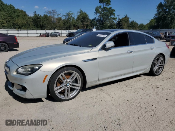 2013 BMW 6 Series 650i xDrive with VIN WBA6B4C54DD098738, listed as a Copart auction lot 75511714 with 81,581 mi miles and Salvage Title. Bid and sale history available at carsss.com. Image 1.