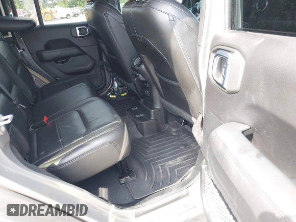 2019 Jeep Wrangler Unlimited Sahara with VIN 1C4HJXEG6KW644553, listed as a IAAI auction lot 42465842 with 40,226 mi miles and . Bid and sale history available at DreamBid. Image 8.