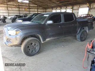 2021 Toyota Tacoma SR z VIN 3TMCZ5AN9MM396426, wystawiony jako Copart lot #59879915 z przebiegiem Nie podano mil oraz Szkoda całkowita • Salvage title. Historia ofert i sprzedaży dostępna na DreamBid. Obrazek 1.