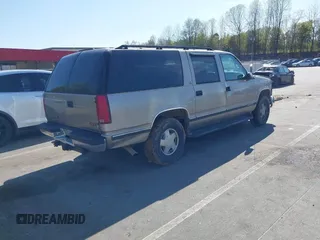 1999 GMC Suburban with VIN 3GKFK16R4XG514928, listed as a IAAI auction lot 41934636 with 245,010 mi miles and . Bid and sale history available at DreamBid. Image 4.