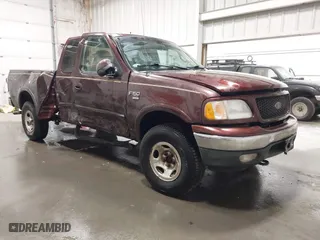 2000 Ford F-150 XL with VIN 1FTRX18W0YNB27461, listed as a IAAI auction lot 41643035 with 111,847 mi miles. Bid and sale history available at carsss.com. Image 1.