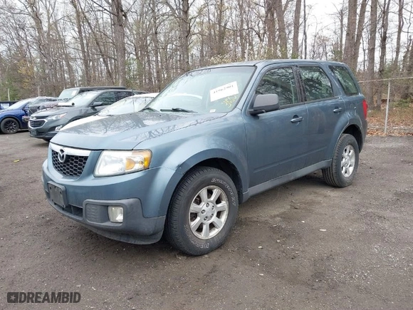 2010 Mazda Tribute Sport with VIN 4F2CY9C79AKM01295, listed as a IAAI auction lot 41962901 with 183,002 mi miles. Bid and sale history available at carsss.com. Image 2.