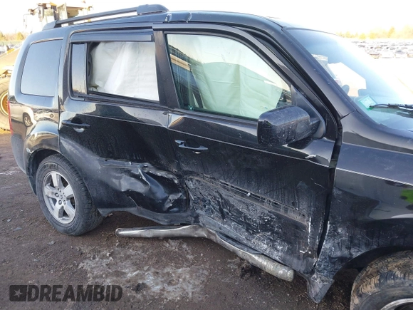 2009 Honda Pilot EX-L with VIN 5FNYF48649B026889, listed as a IAAI auction lot 41643289 with 121,511 mi miles and . Bid and sale history available at carsss.com. Image 6.