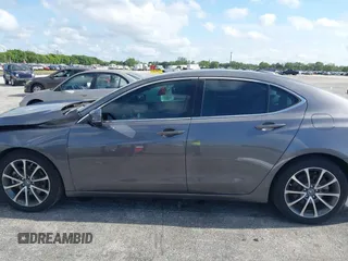 2019 Acura TLX z VIN 19UUB2F38KA002232, wystawiony jako IAAI lot #42271717 z przebiegiem 27 945 mil mil oraz . Historia ofert i sprzedaży dostępna na DreamBid. Obrazek 14.