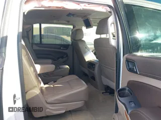 2017 Chevrolet Suburban Premier z VIN 1GNSKJKC9HR117378, wystawiony jako IAAI lot #41610682 z przebiegiem Nie podano mil oraz . Historia ofert i sprzedaży dostępna na DreamBid. Obrazek 8.