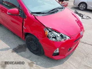 2014 Toyota Prius One z VIN JTDKDTB37E1566373, wystawiony jako IAAI lot #42416089 z przebiegiem 61 672 mil mil oraz . Historia ofert i sprzedaży dostępna na DreamBid. Obrazek 6.