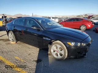 2018 Jaguar XE 25t with VIN SAJAR4FX6JCP27215, listed as a Copart auction lot 88518935 with 75,559 mi miles and Salvage Title. Bid and sale history available at carsss.com. Image 4.