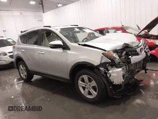 2014 Toyota RAV4 XLE with VIN JTMRFREV5ED052819, listed as a IAAI auction lot 42014672 with 235,481 mi miles and . Bid and sale history available at DreamBid. Image 1.