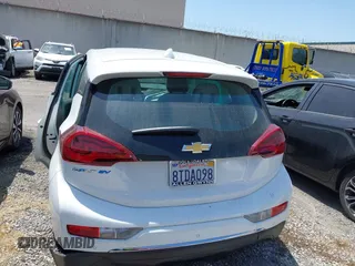 2020 Chevrolet Bolt EV LT with VIN 1G1FY6S03L4132176, listed as a IAAI auction lot 42211304 with 62,063 mi miles and . Bid and sale history available at DreamBid. Image 17.