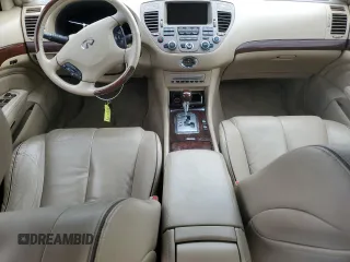 2005 Infiniti Q45 z VIN JNKBF01A85M101123, wystawiony jako Copart lot #72220124 z przebiegiem 111 464 mil mil oraz Szkody całkowita. Historia ofert i sprzedaży dostępna na DreamBid. Obrazek 8.
