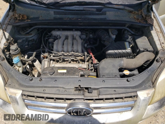 2005 Kia Sportage LX with VIN KNDJE723657067187, listed as a Copart auction lot 57403525 with 228,648 mi miles and Clean title. Bid and sale history available at DreamBid. Image 12.