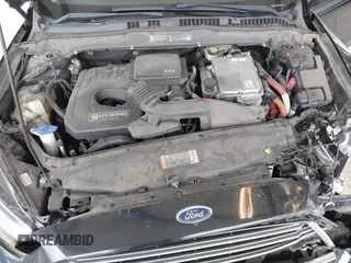 2016 Ford Fusion SE Hybrid with VIN 3FA6P0LU1GR106980, listed as a IAAI auction lot 41895379 with 200,226 mi miles. Bid and sale history available at carsss.com. Image 10.