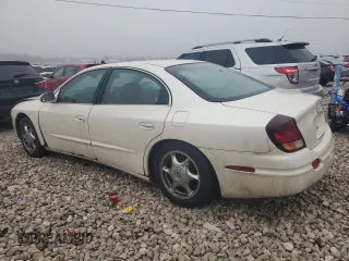 2002 Oldsmobile Aurora z VIN 1G3GS64C324168436, wystawiony jako Copart lot #84952644 z przebiegiem 152 785 mil mil oraz Tytuł czysty. Historia ofert i sprzedaży dostępna na DreamBid. Obrazek 2.