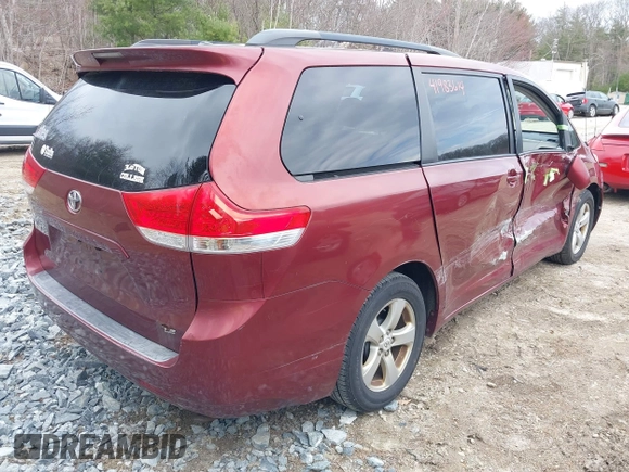 2011 Toyota Sienna LE AAS with VIN 5TDKK3DC3BS034894, listed as a IAAI auction lot 41983614 with 217,308 mi miles. Bid and sale history available at carsss.com. Image 4.