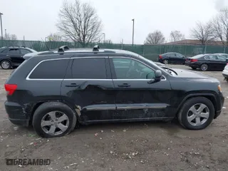 2011 Jeep Grand Cherokee Laredo with VIN 1J4RR4GGXBC511475, listed as a IAAI auction lot 41554620 with 164,361 mi miles. Bid and sale history available at carsss.com. Image 13.