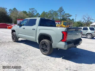 2025 Toyota Tundra 4WD SR with VIN 5TFLA5DB3SX261247, listed as a IAAI auction lot 41577359 with 381 mi miles. Bid and sale history available at carsss.com. Image 3.