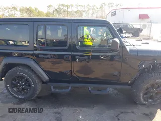 2021 Jeep Wrangler Unlimited Sport S with VIN 1C4HJXDN6MW812565, listed as a IAAI auction lot 41506140 with 27,273 mi miles and . Bid and sale history available at DreamBid. Image 13.