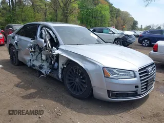 2015 Audi A8 4.0T z VIN WAU32AFD2FN038880, wystawiony jako IAAI lot #42138932 z przebiegiem 102 968 mil mil oraz . Historia ofert i sprzedaży dostępna na DreamBid. Obrazek 6.
