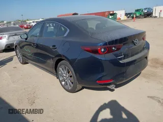 2025 Mazda 3 S Preferred with VIN 3MZBPACM9SM454771, listed as a IAAI auction lot 41997209 with 3,748 mi miles and . Bid and sale history available at DreamBid. Image 3.