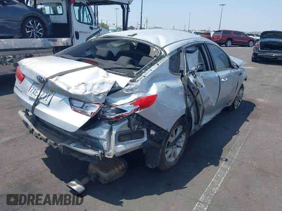 2017 Kia Optima LX z VIN KNAGT4L32H5157432, wystawiony jako IAAI lot #42154009 z przebiegiem 83 496 mil mil oraz . Historia ofert i sprzedaży dostępna na DreamBid. Obrazek 4.