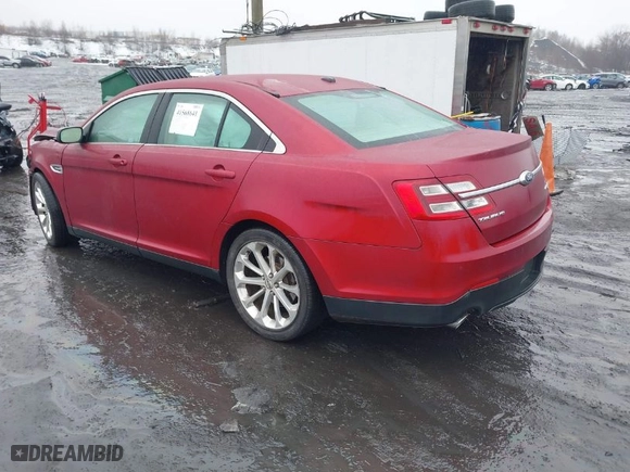 2015 Ford Taurus Limited with VIN 1FAHP2J89FG110114, listed as a IAAI auction lot 41568641 with 153,579 mi miles. Bid and sale history available at carsss.com. Image 3.